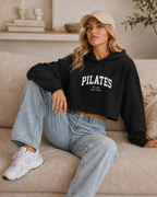 Pilates Cropped Hoodie — 'Pilates' Varsity Logo Crop Top for Fitness & Leisure